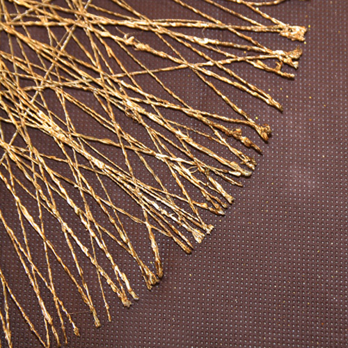 Détail nappe chocolat et set de table en sinamay
