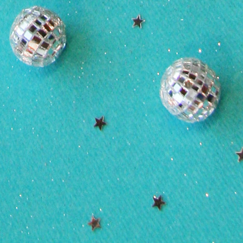 Eléments décoratifs boules disco et paillettes étoiles