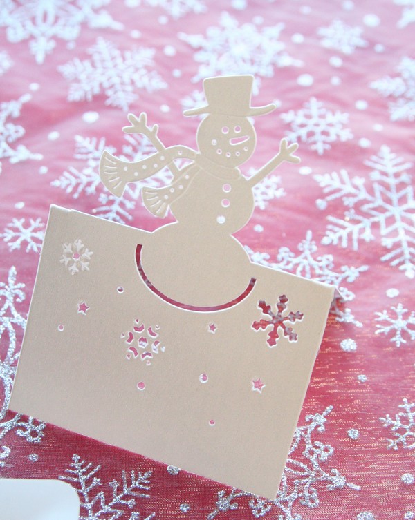 Marque-place en forme de bonhomme de neige
